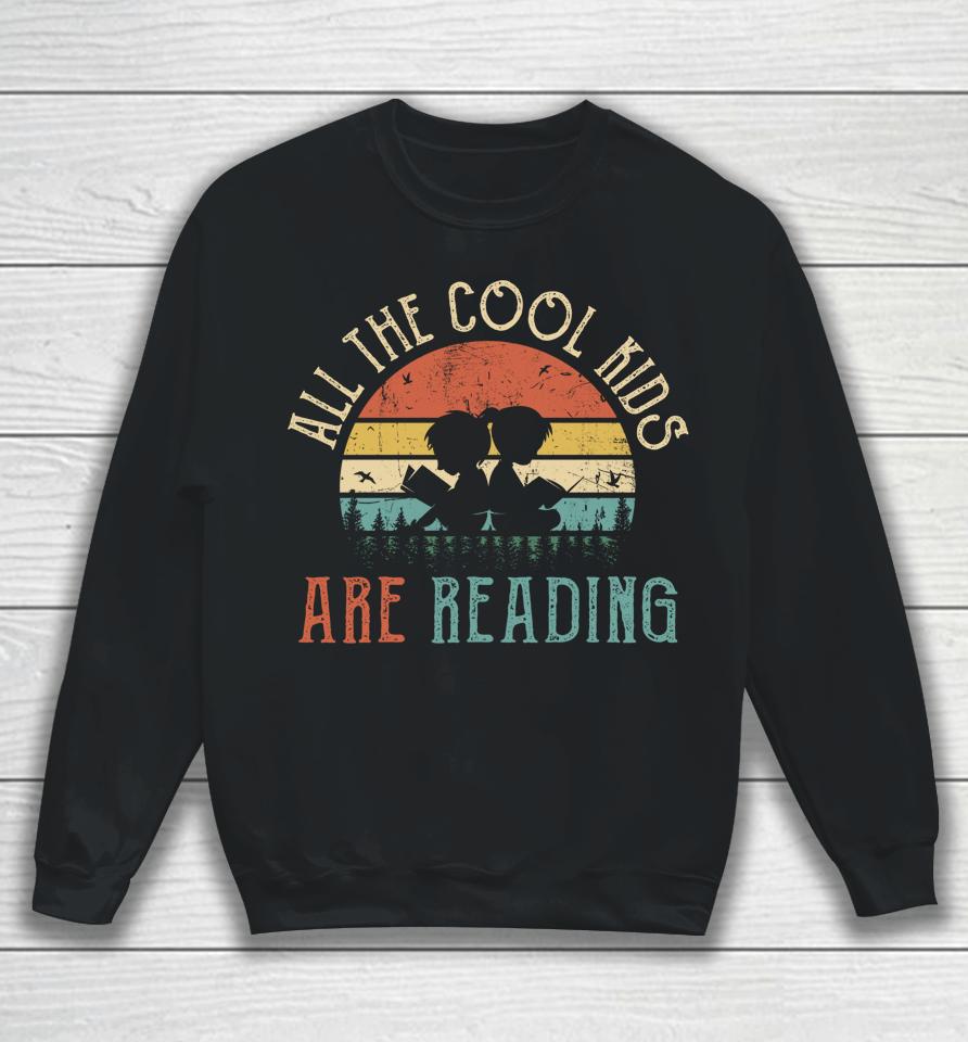 All The Cool Kids Are Reading Book Vintage Reto Sunset Long Sleeve Sweatshirt