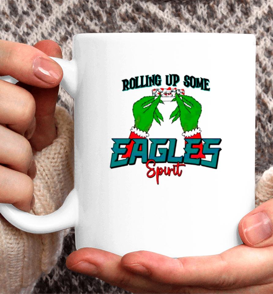 Grinch Rolling Up Some Eagles Spirit Coffee Mug