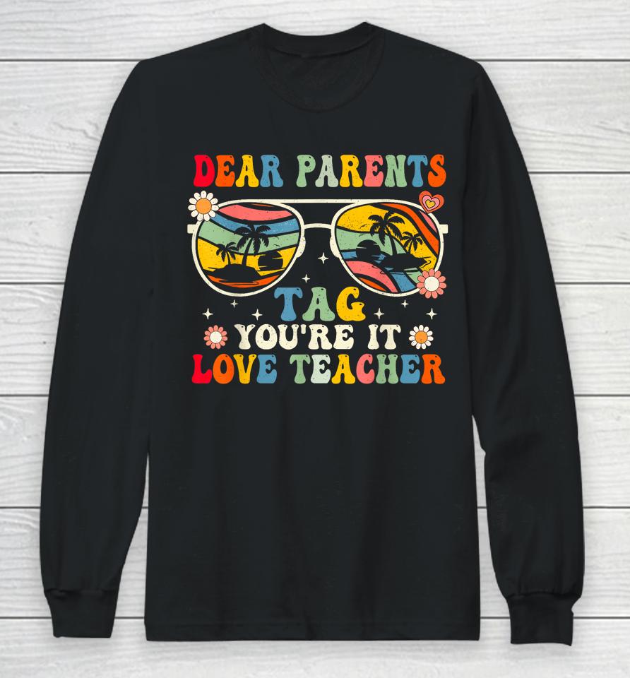 Groovy Dear Parents Tag Youre It Last Day Of School Teacher Long Sleeve T-Shirt