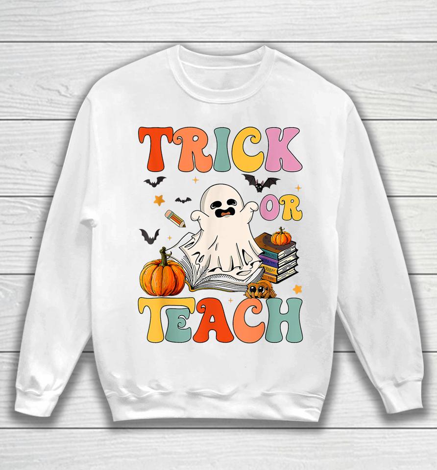 Groovy Halloween Trick Or Teach Retro Floral Ghost Teacher Sweatshirt