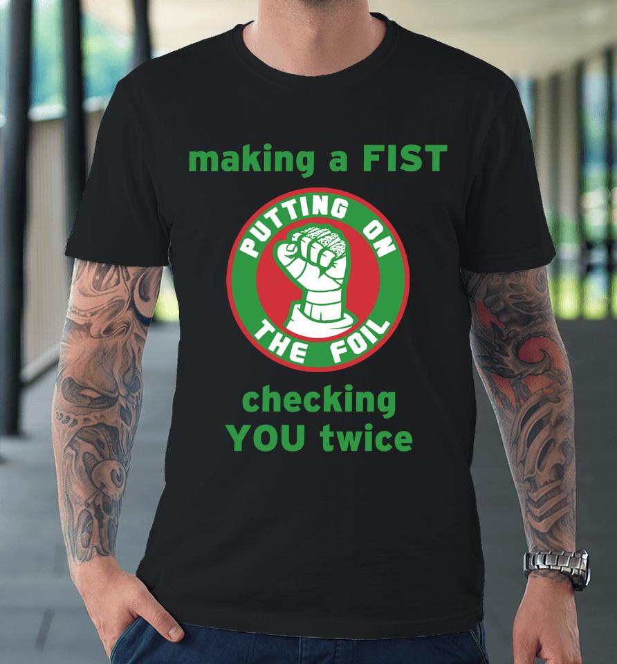 Making A Fist Putting On The Foil Premium T-Shirt