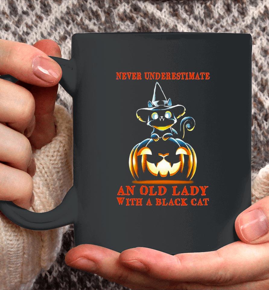 Never Underestimate An Old Lady With A Black Cat Halloween Pumpkin Coffee Mug