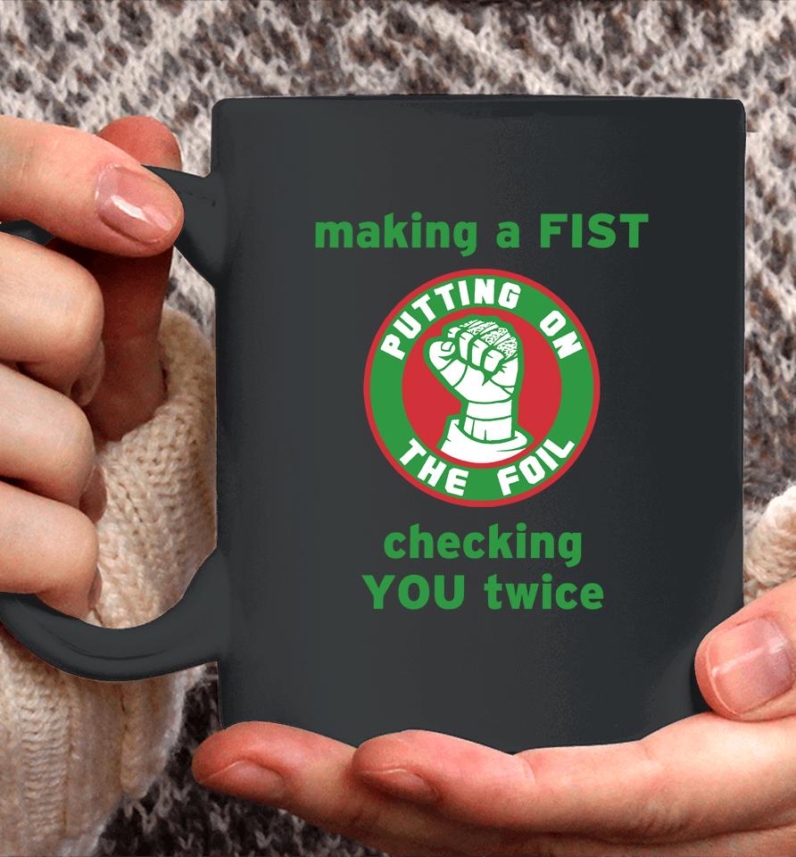 Putting On The Foil Making A Fist Checking You Twice Coffee Mug