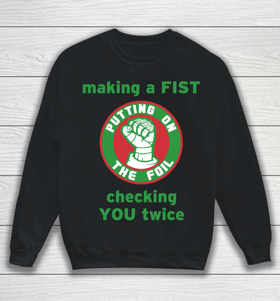 Putting On The Foil Making A Fist Checking You Twice Sweatshirt