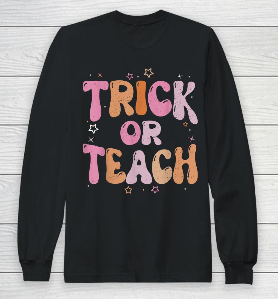 Retro Vintage Groovy Trick Or Teach Halloween Teacher Life Long Sleeve T-Shirt