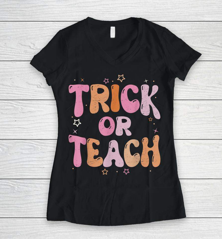 Retro Vintage Groovy Trick Or Teach Halloween Teacher Life Women V-Neck T-Shirt