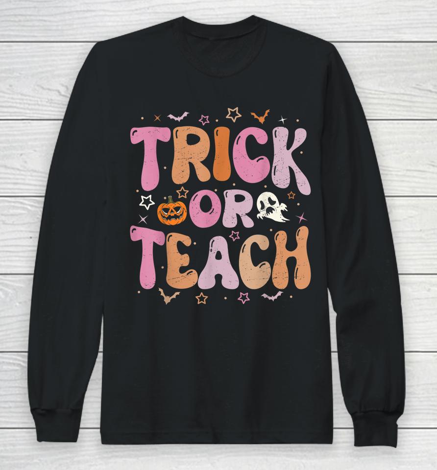 Retro Vintage Groovy Trick Or Teach Halloween Teacher Life Long Sleeve T-Shirt