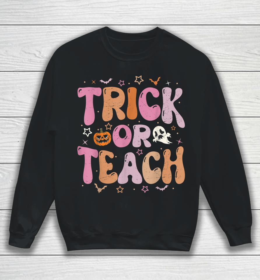 Retro Vintage Groovy Trick Or Teach Halloween Teacher Life Sweatshirt