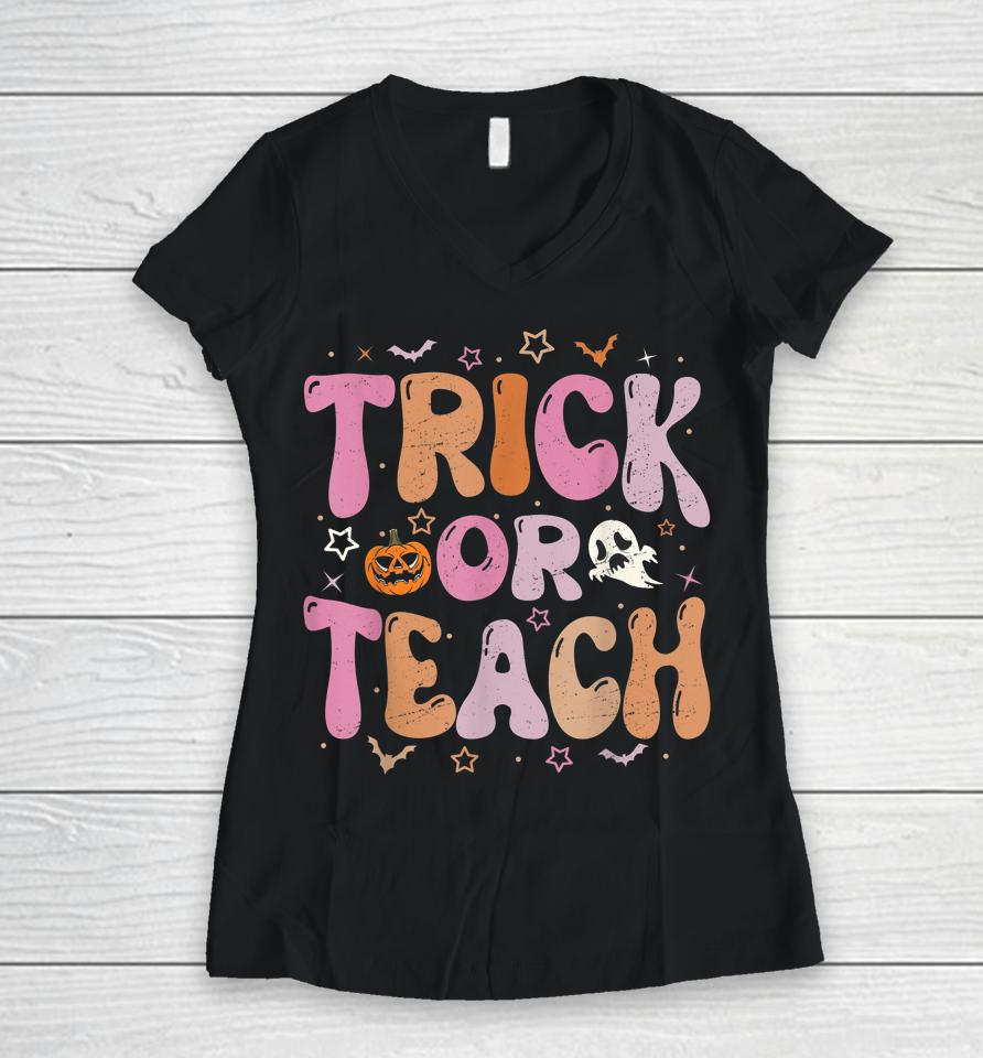 Retro Vintage Groovy Trick Or Teach Halloween Teacher Life Women V-Neck T-Shirt