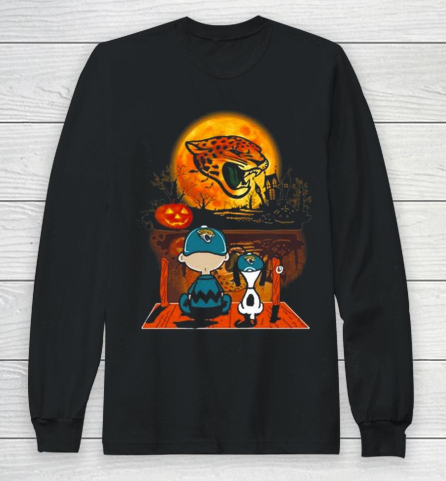 Snoopy And Charlie Brown Jacksonville Jaguars Sitting Under Moon Halloween 2023 Long Sleeve T-Shirt