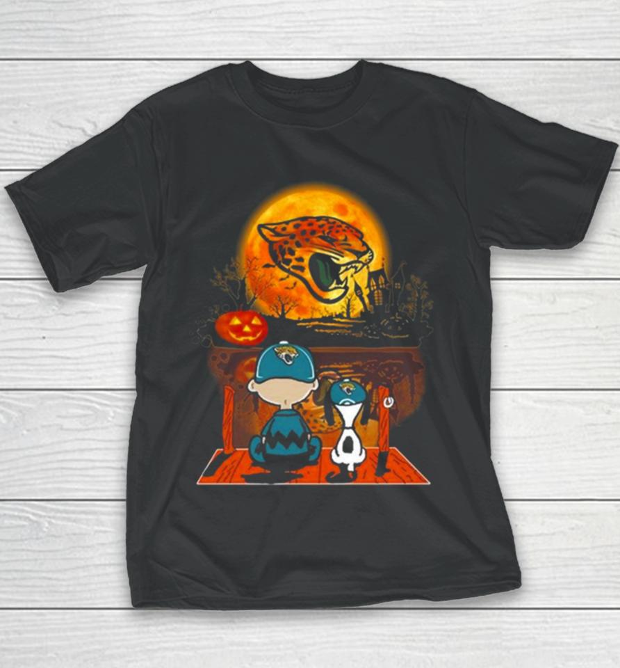 Snoopy And Charlie Brown Jacksonville Jaguars Sitting Under Moon Halloween 2023 Youth T-Shirt
