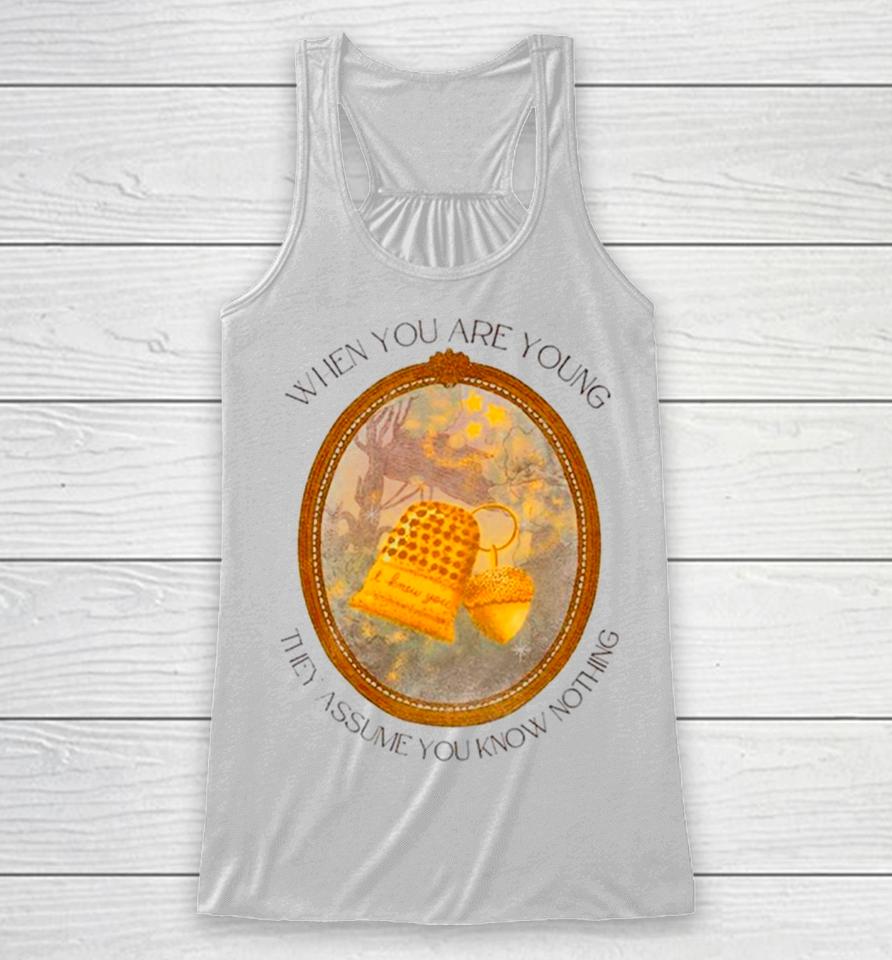 When You Are Young They Assume You Know Nothing Racerback Tank